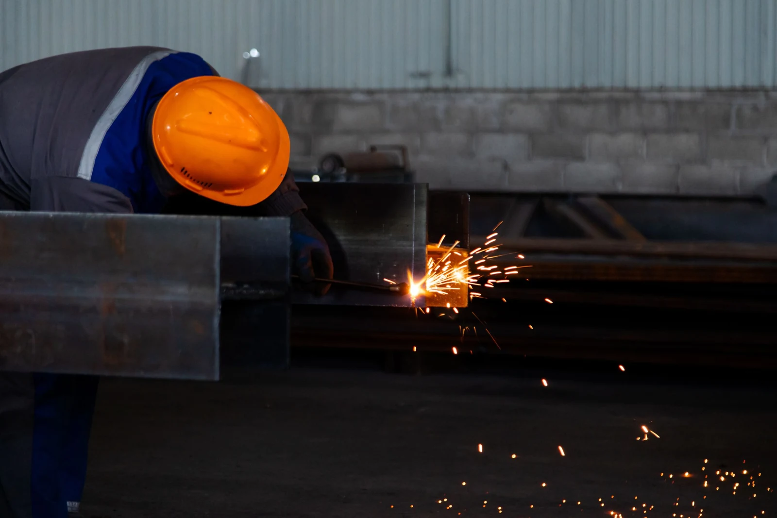 Real photograph of metal fabrication with protective equipment