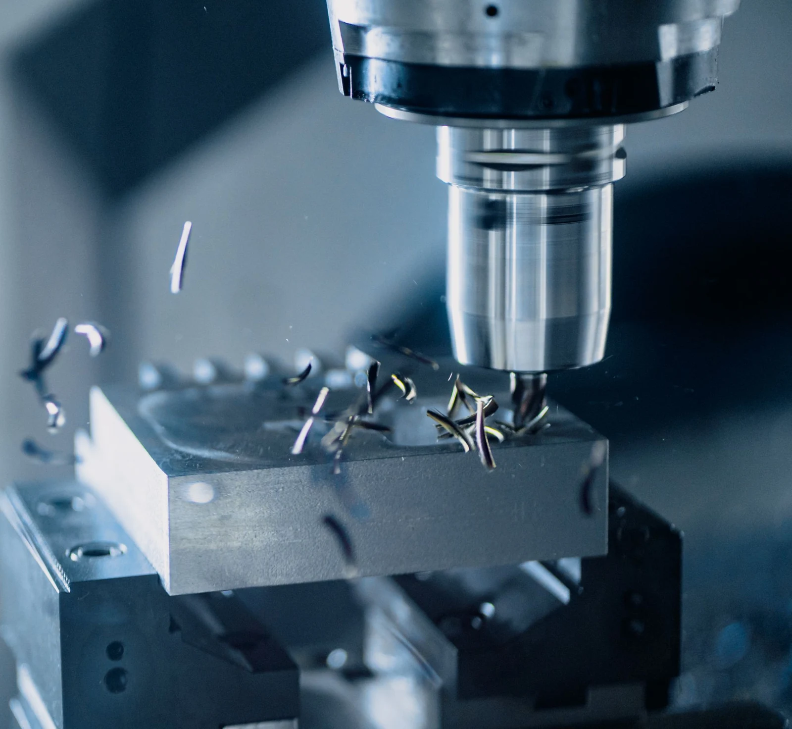 Real photograph of a technician working on an industrial valve